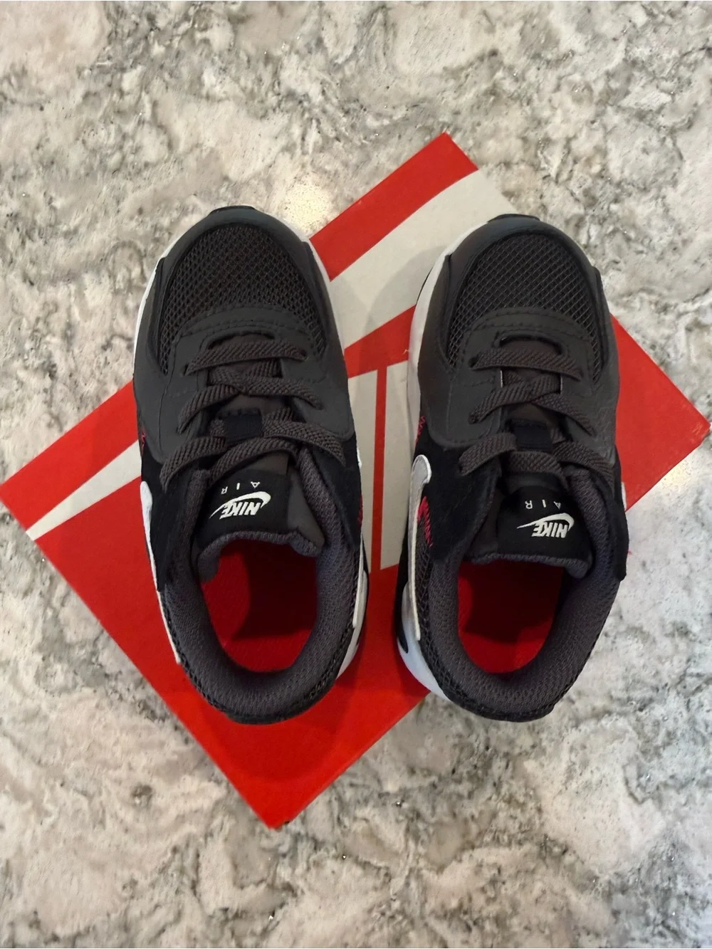 Nike Kids Black/White Sneakers with Red Stitch Accents